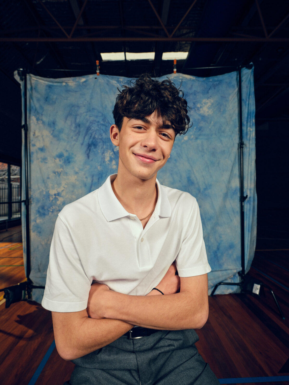 An image of a school kid smiling at school photos